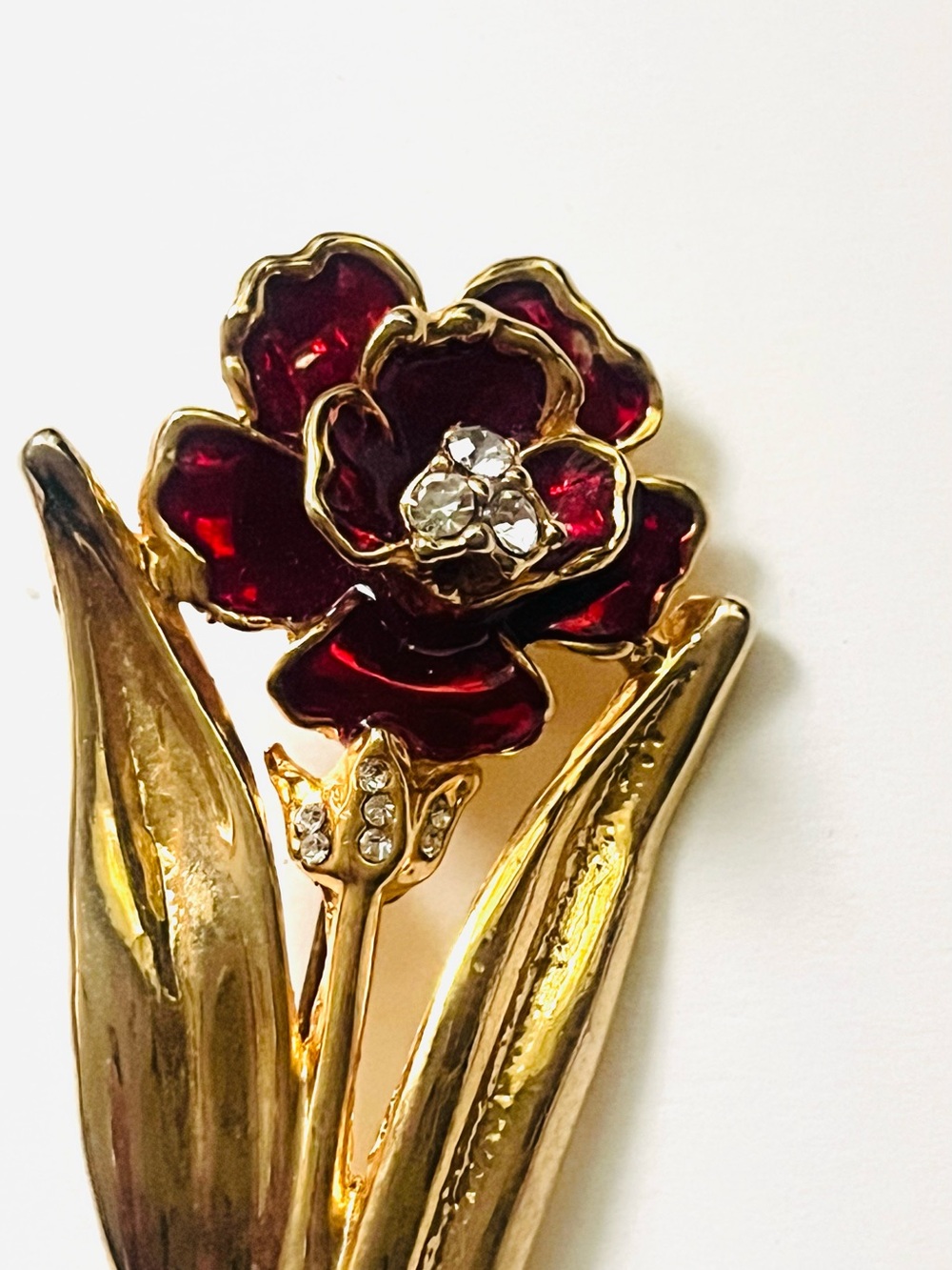 Gold-Tone Red Enamel Flower Brooch with Crystal Accents